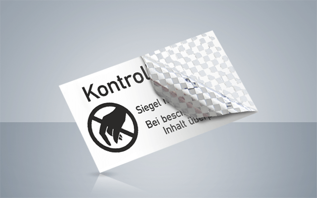 Manipulationssicheres Kontrollsiegel aus Sicherheitsfolie und Dokumentenfolie mit Void-Effekt beim Ablösen
