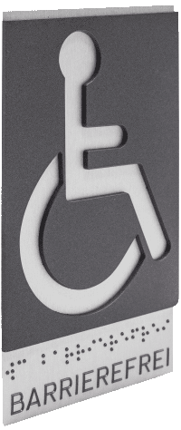 Schild mit Rollstuhlfahrer-Piktogramm und Aufschrift BARRIEREFREI
